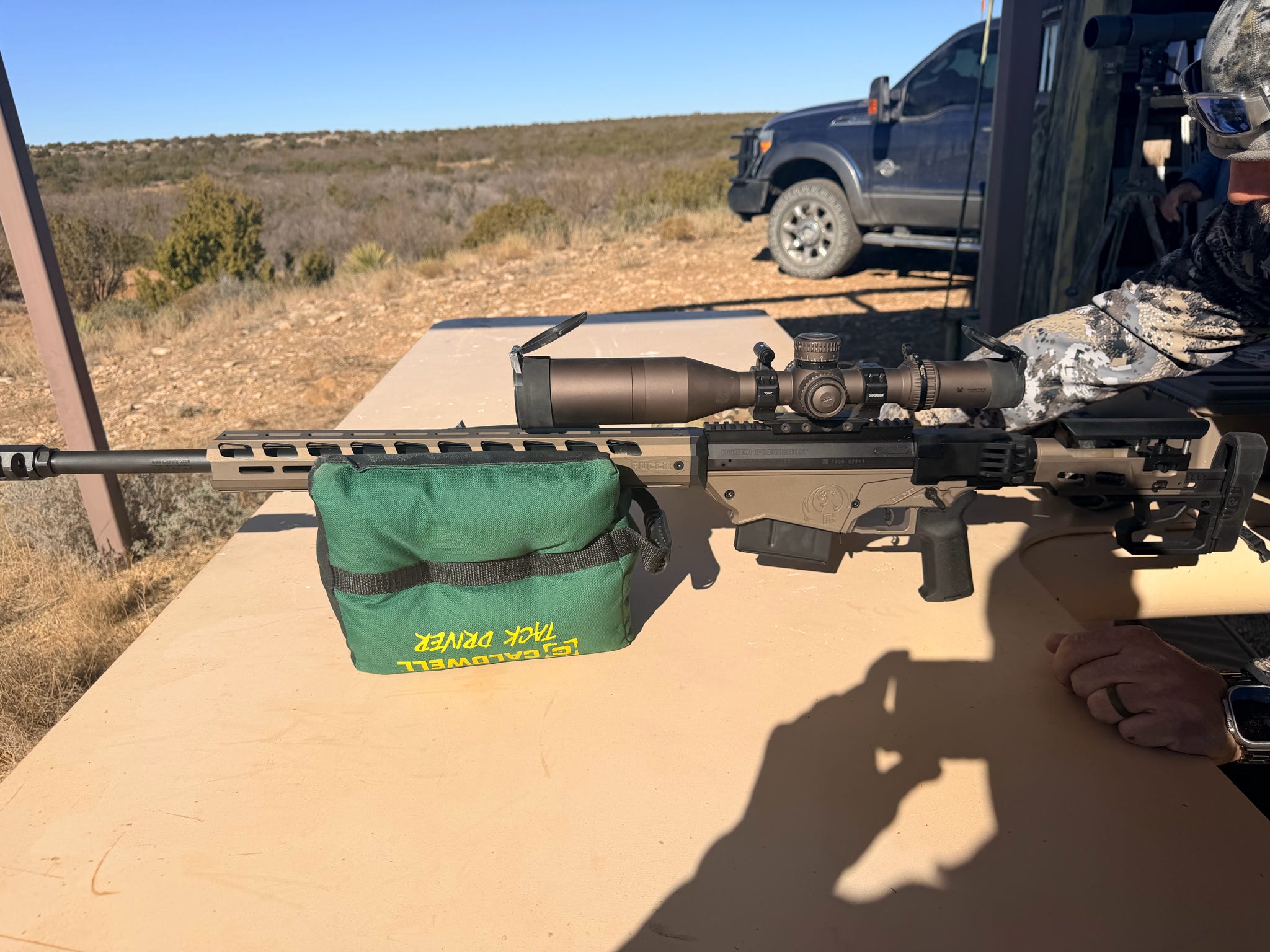 A precision rifle set up on the bench